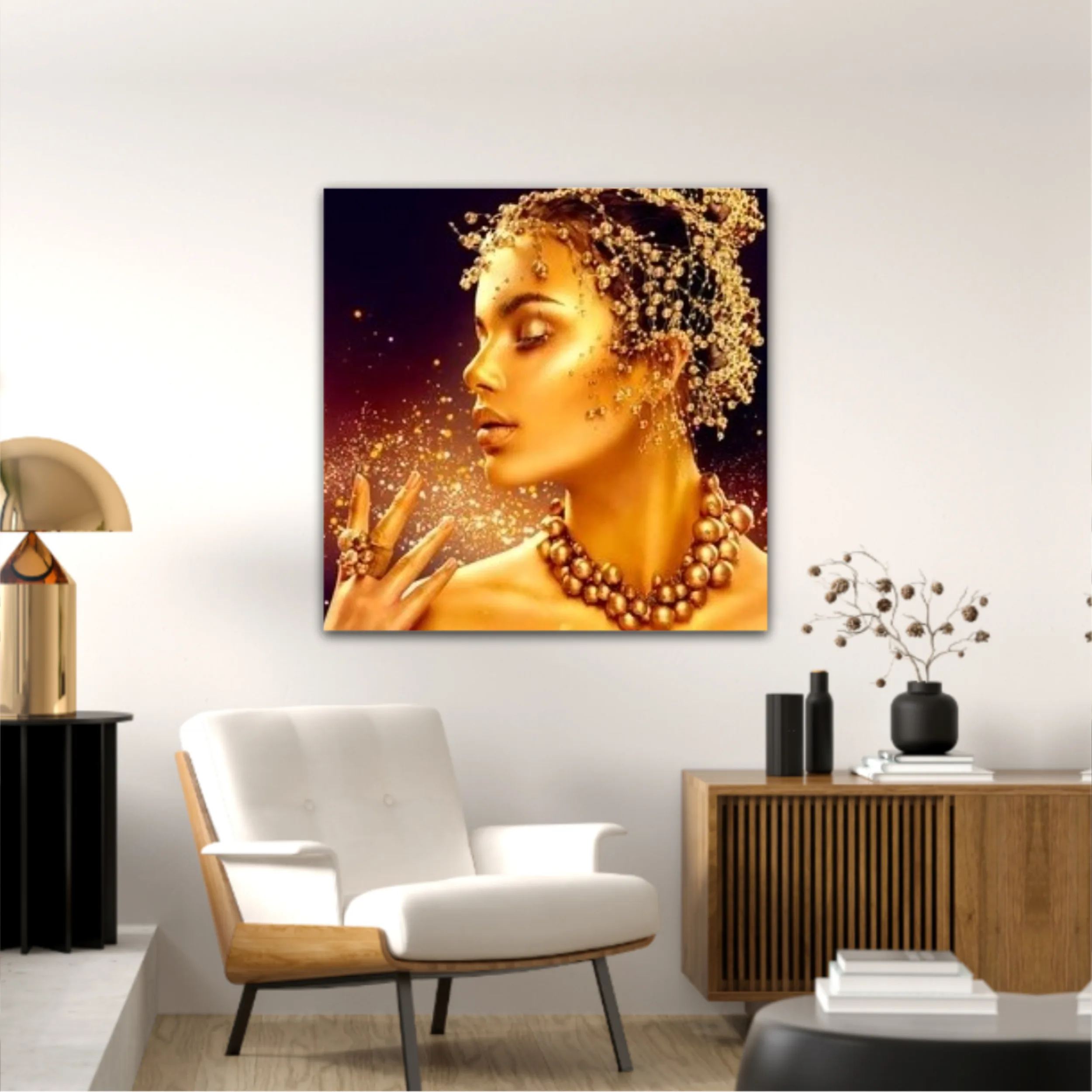 Fashion golden woman blowing sparkles