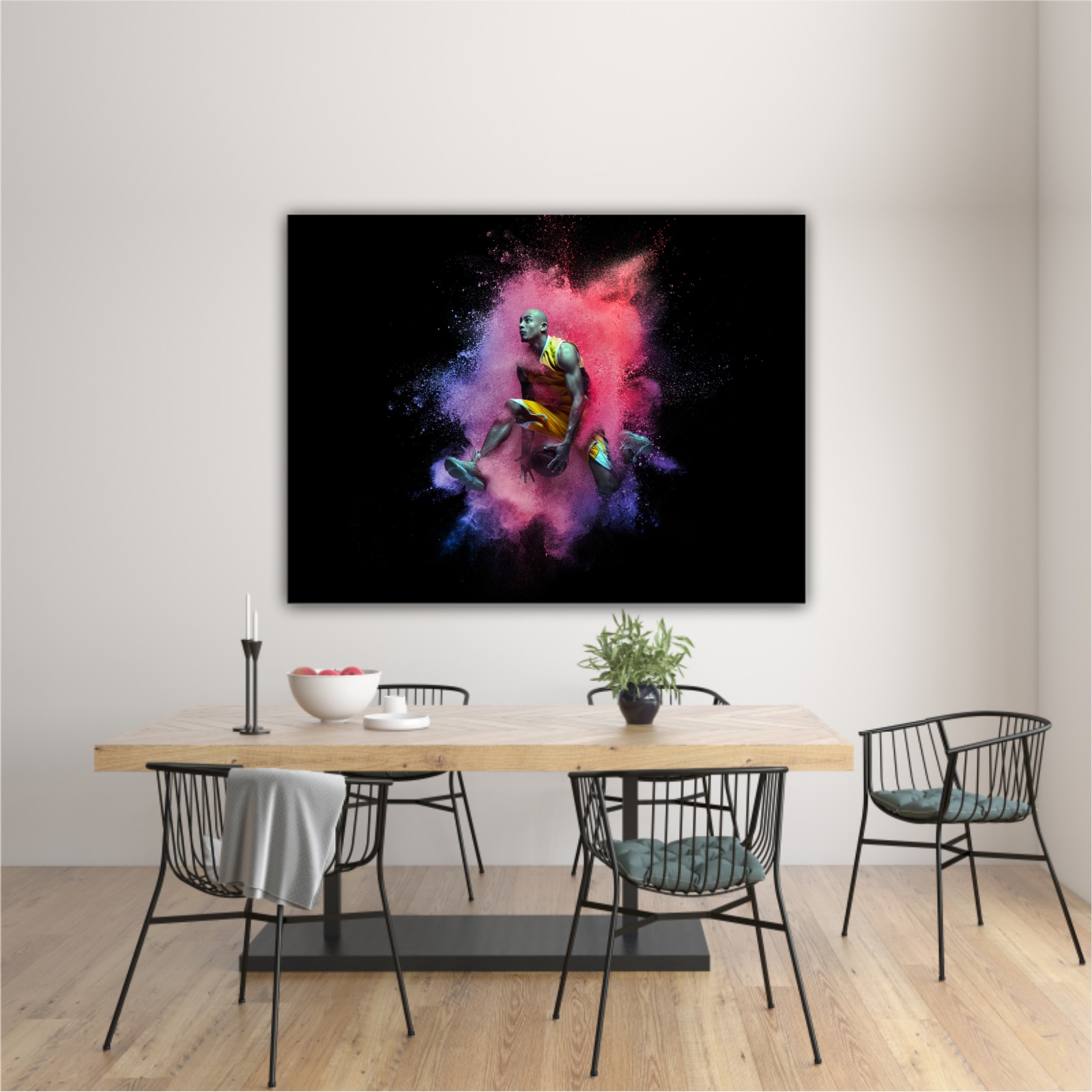 Young man, male basketball player in explosion of colored neon pink powder isolated on black background.